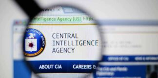 Magnifying glass over CIA website.