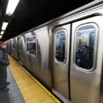 Man waiting at subway platform