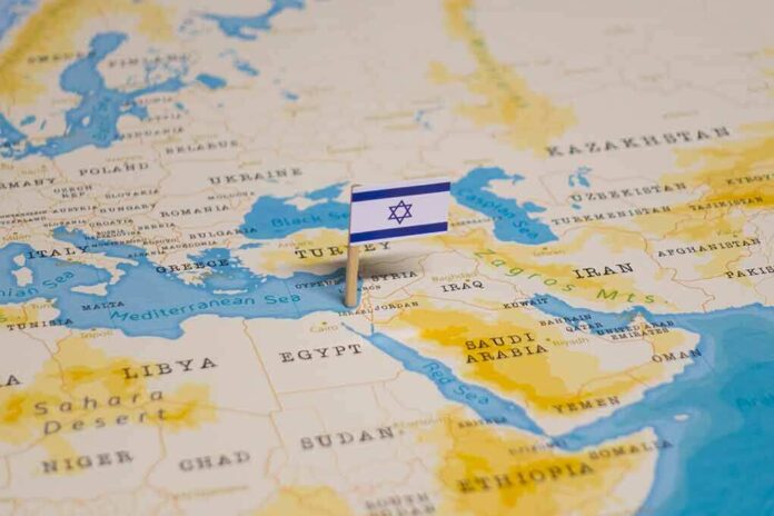 1817863325 featured image Israeli flag pinned on Middle East map.
