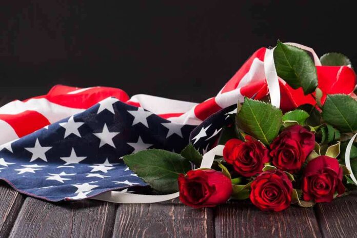 383258863 featured image American flag with red roses on dark background