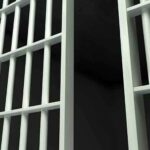 Close-up of prison cell bars