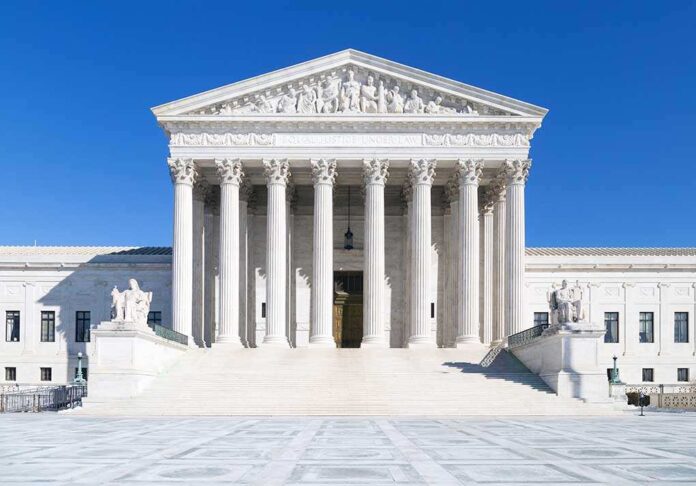 179112365 featured image United States Supreme Court building under clear blue sky.