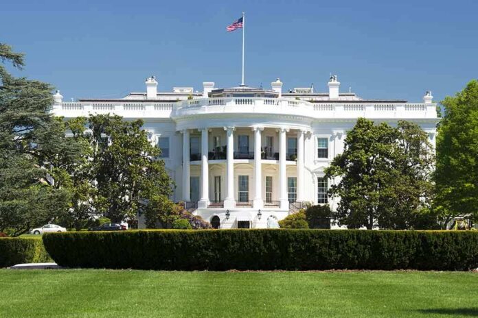 147037244 featured image White House with American flag and green lawn