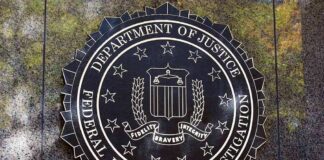 Department of Justice FBI emblem on a wall