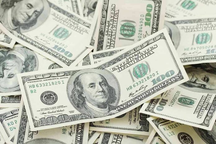 150954545 featured image Pile of US hundred dollar bills