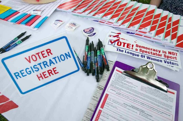 177445370 featured image Voter registration table with forms pens and brochures