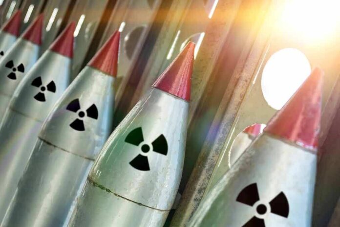 Line of nuclear missiles with radiation hazard signs