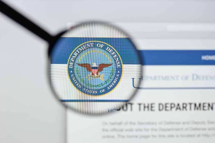 1168986508 featured image Magnifying glass over Department of Defense logo