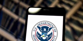 U.S. Department of Homeland Security logo on smartphone