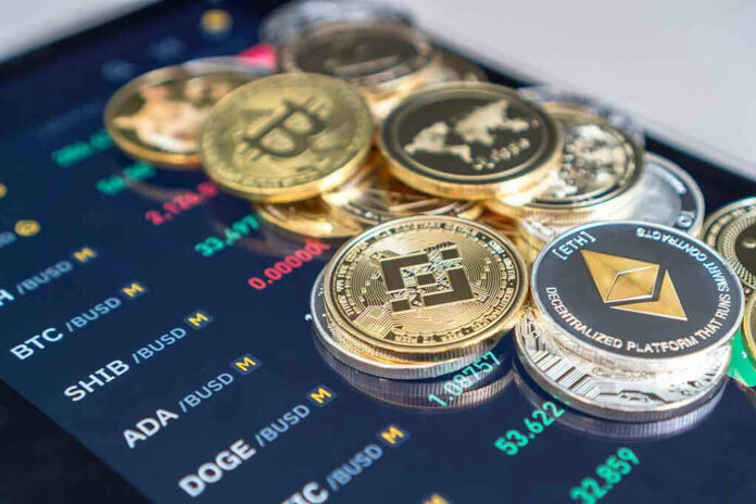 2002007354 Cryptocurrency coins on a trading screen background