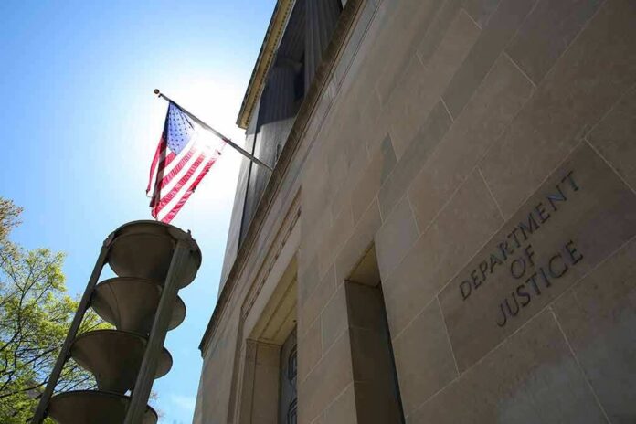 2152403209 featured image American flag at Department of Justice building exterior