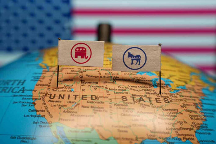 2428155117 Republican and Democratic flags on USA map background.