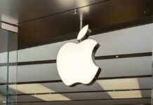 Illuminated Apple logo inside a store