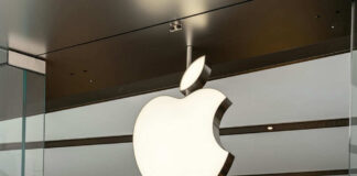 Illuminated Apple logo inside a store