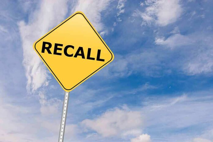 529192612 featured image Yellow Recall road sign against a cloudy sky