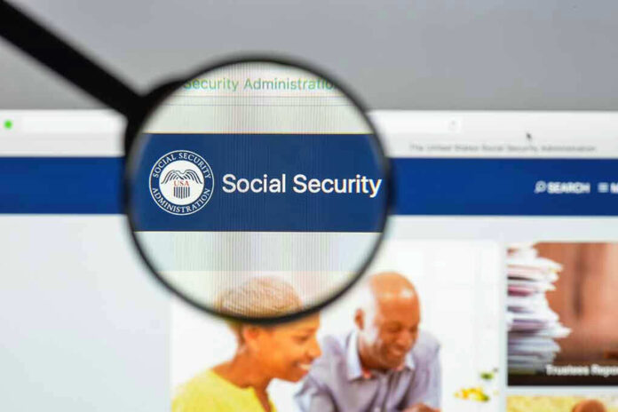 Magnifying glass focusing on Social Security Administration webpage