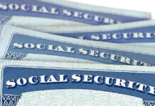 Several Social Security cards stacked together