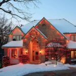 The Holiday Finance Trap: Families in Crisis A beautifully decorated house with Christmas lights in a snowy setting