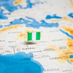 Boko Haram’s Bold Move Shocks Nigeria Flag pin marking Nigeria on Africa map