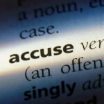Military SHOCKER — 67% Women Harassed! Close-up dictionary definition of accuse underlined.
