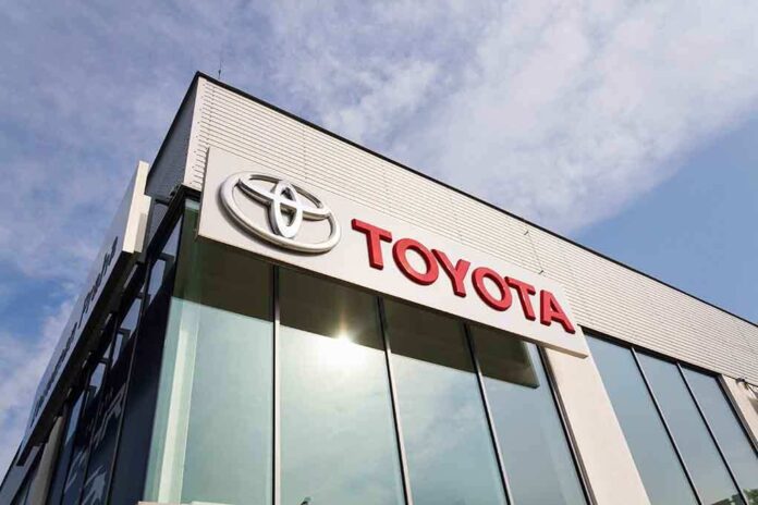 Exterior view of a Toyota dealership with a prominent logo