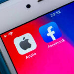 Apple and Facebook apps on smartphone screen