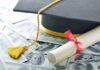 Shocking! UndocuGrad Ceremonies Graduation cap and diploma resting on a pile of money