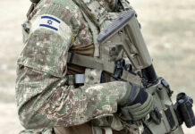 Beaufort Ridge Seized—Again Soldier in camouflage gear with Israeli flag patch.
