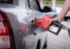 Gas Prices Soar—Trump’s To Halt Gas Tax A person refueling a car at a gas station