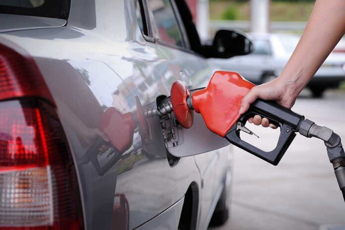Petrol,Pump,Filling A person refueling a car at a gas station