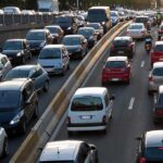 Air Quality Disaster: Pollutant Surge After NYC Toll Heavy traffic on a city highway during rush hour