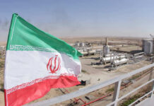 White House Bombshell, Tehran Denies Iranian flag near an industrial gas refinery.