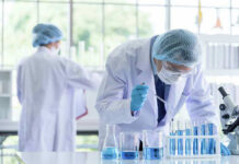 Sunblock Breakthrough—Why Did FDA Wait? Scientists working in a laboratory with test tubes