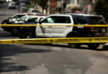 World Cup Traffic Turned War Zone Police tape blocking street with patrol cars.