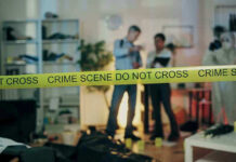 Guilty Bombshell In Gilgo Beach Crime scene with tape and investigators examining evidence.