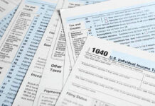 Six Billion at Risk — Over a Missing Line? Tax forms and documents overlapping on surface