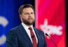 JD Vance Torches ‘JCPOA 2.0’ Hype A man in a suit delivering a speech at a conference