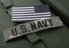 U.S. Navy patch with black-and-white American flag.