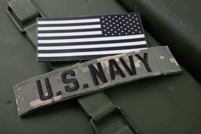 U.S. Navy patch with black-and-white American flag.