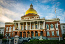 Communist Revolution? Press Secretary’s Bold Claim Building with golden dome and columns under a blue sky.