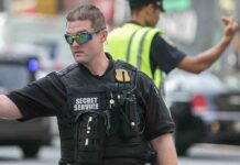 Stunning Secret Service Meltdown A Secret Service agent directing traffic in an urban setting