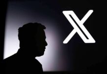 Space FCC Brawl: Musk vs. Legacy Titans silhouette of a person beside a large X logo