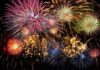 Colorful fireworks exploding in the night sky