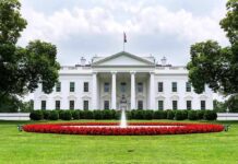 Video Urges People to Storm the White House and Kill Trump The White House with fountain and red flower bed