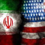Iran and United States flags with smoky overlay