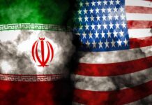 Banks Warned: Iran Or America Iran and United States flags with smoky overlay