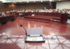 Nick Reiner Trust Fund Showdown Amid Double-Murder Conference microphone on a podium in a courtroom