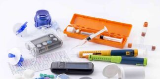 Diabetes management tools and supplies on a white surface