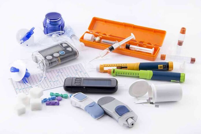 shutterstock_268712894 Diabetes management tools and supplies on a white surface