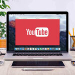 Ontario Sting Uncovers Chilling Online Horror YouTube logo on a laptop screen on desk.